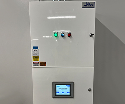 A white box with a screen and buttons